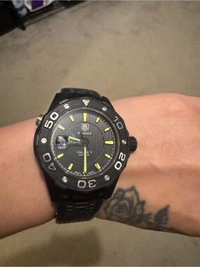Tag Heuer Black Watch with Yellow Accents